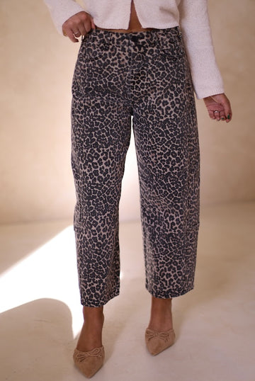 on repeat leopard jeans