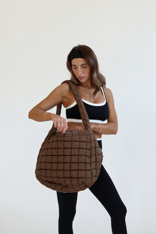 on the move puffer bag